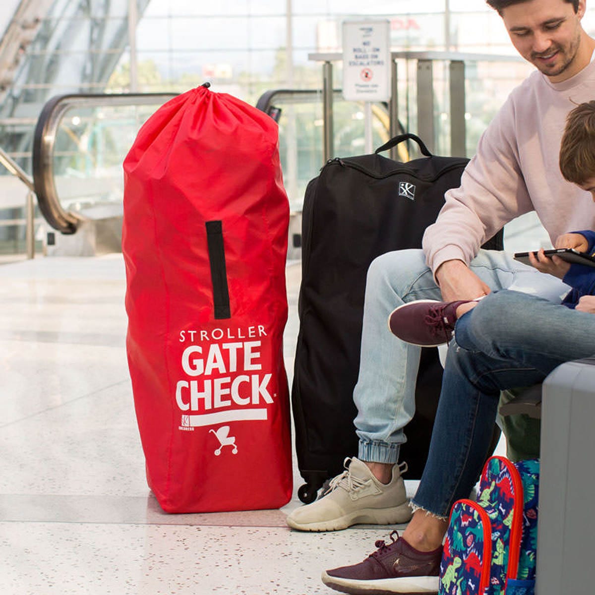 Gate check travel bag for stroller top